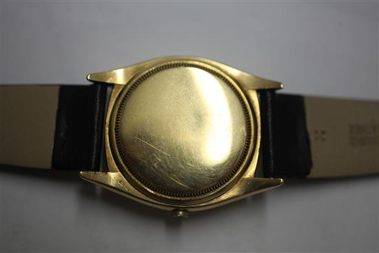 A gentlemans 1950s/1960s 18ct gold Rolex Oyster Perpetual wrist watch, lacking winding crown.